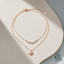 Layered Celestial Star Necklace — product hero — CRYSTARO