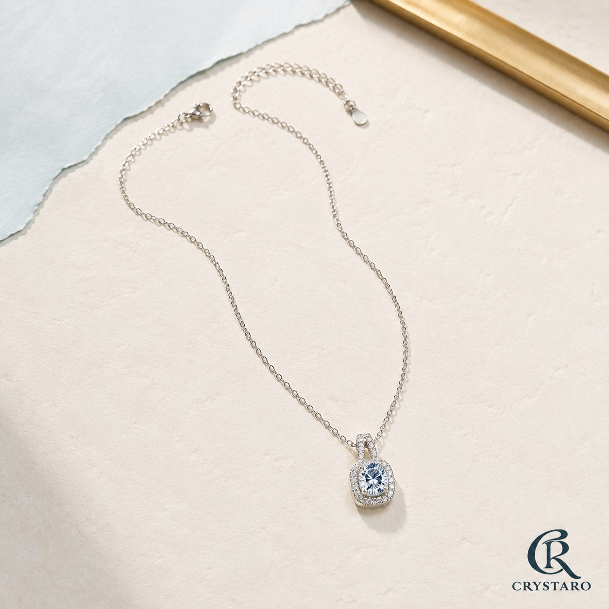Blue gemstone Crystaro necklace in soft natural light
