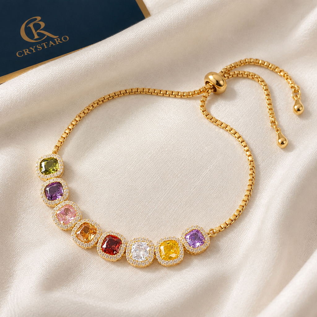 Rainbow Bezel Gemstone Tennis Bracelet — styled product still life — CRYSTARO