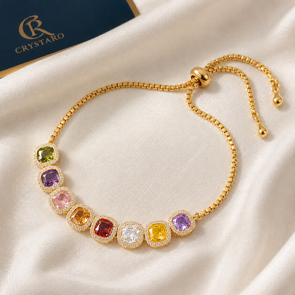 Rainbow Bezel Gemstone Tennis Bracelet — styled product still life — CRYSTARO