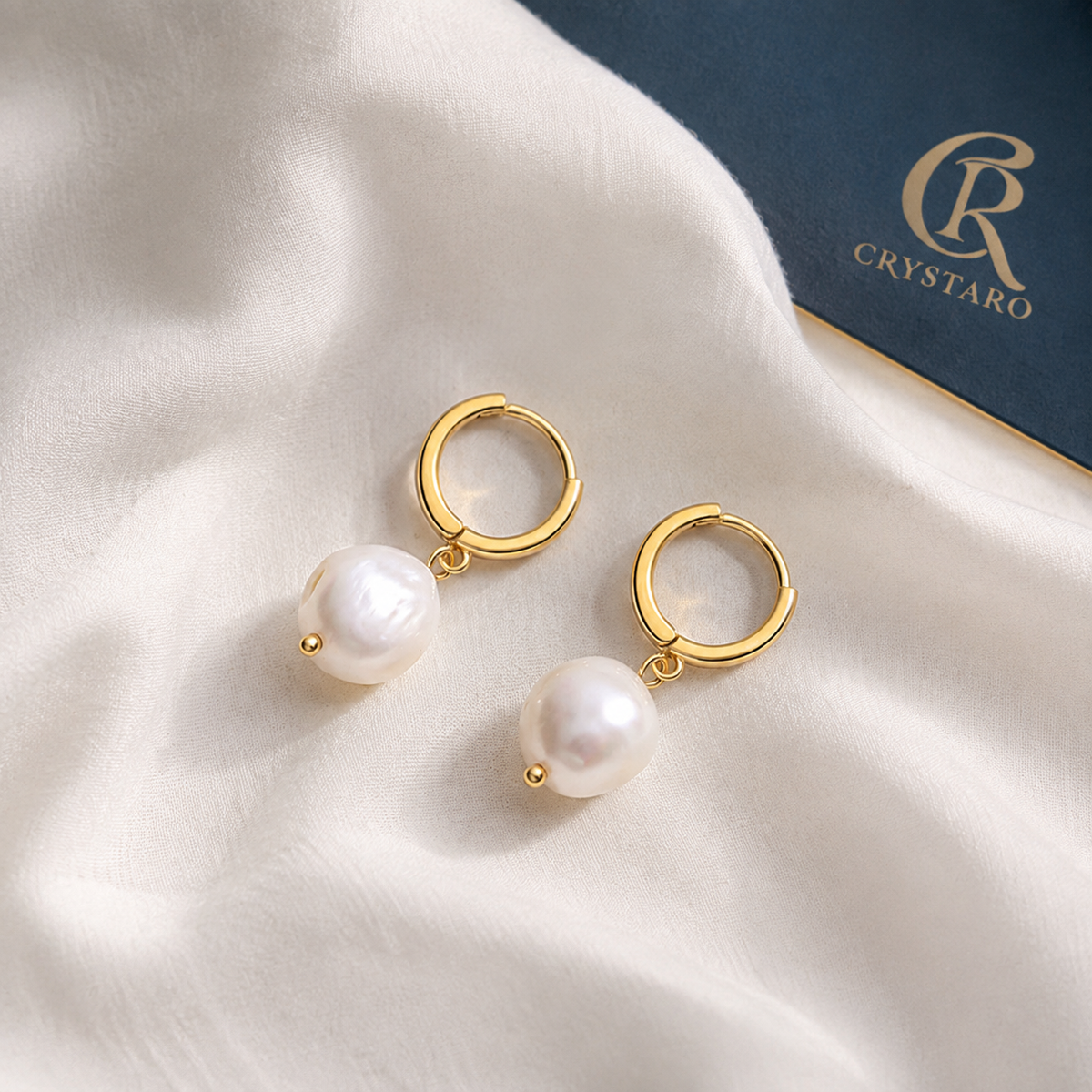 Baroque Pearl-Look Hoop Drop Earrings — styled product still life — CRYSTARO