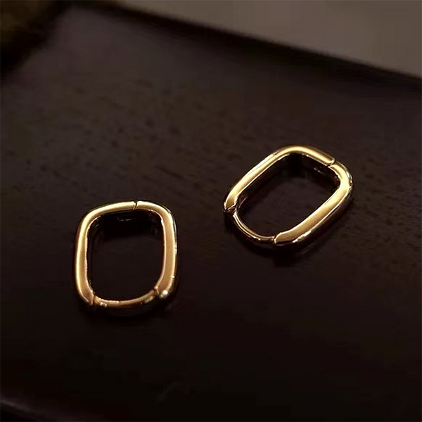Petite Rounded Rectangle Huggie Hoop Earrings — styled product still life — CRYSTARO