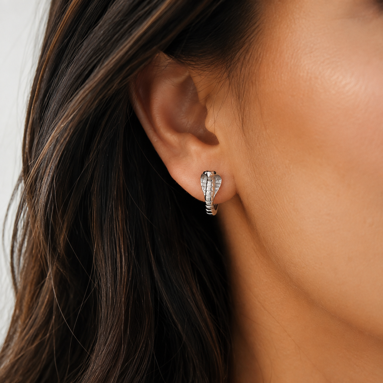 Mixed-Metal Chunky Huggie Hoops — wearing view — CRYSTARO