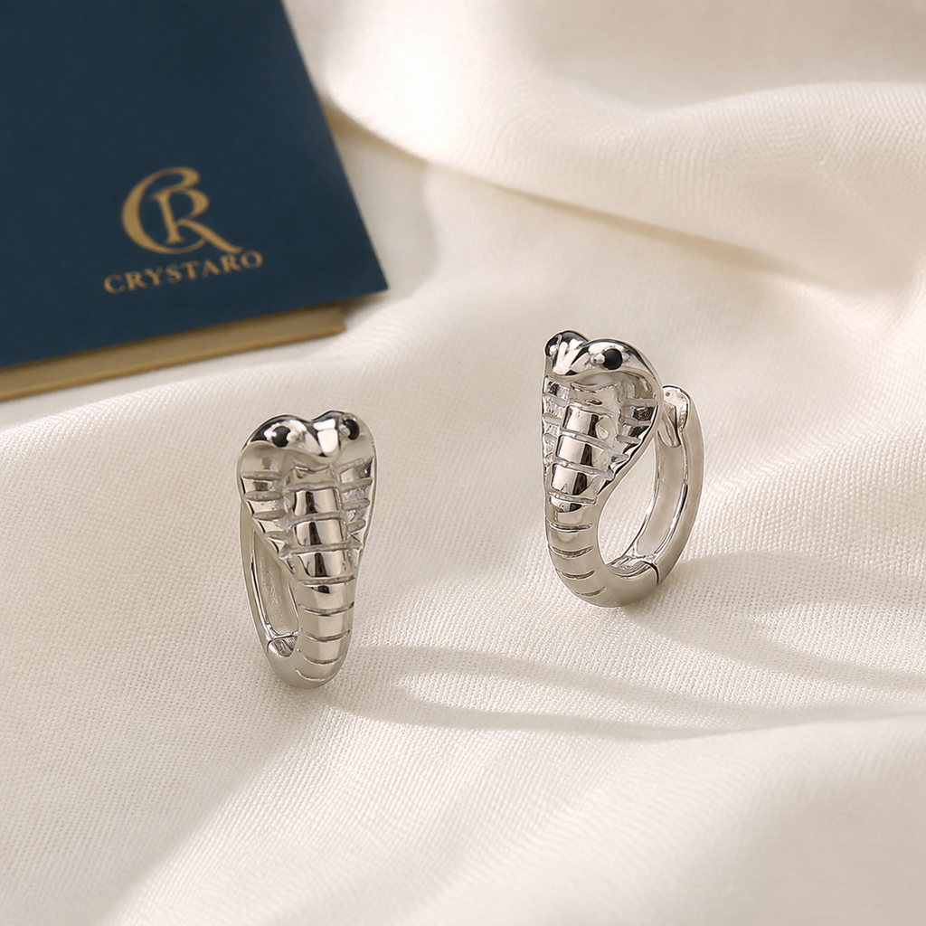 Mixed-Metal Chunky Huggie Hoops — styled product still life — CRYSTARO