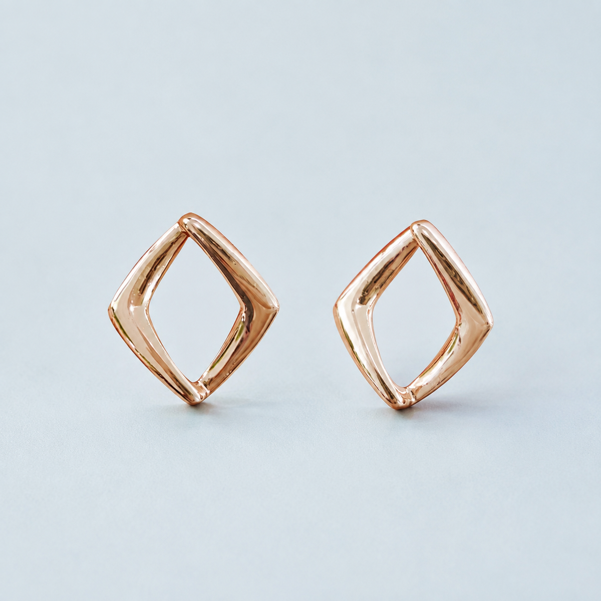 Sculptural Open Diamond Stud Earrings — angle and structure view — CRYSTARO