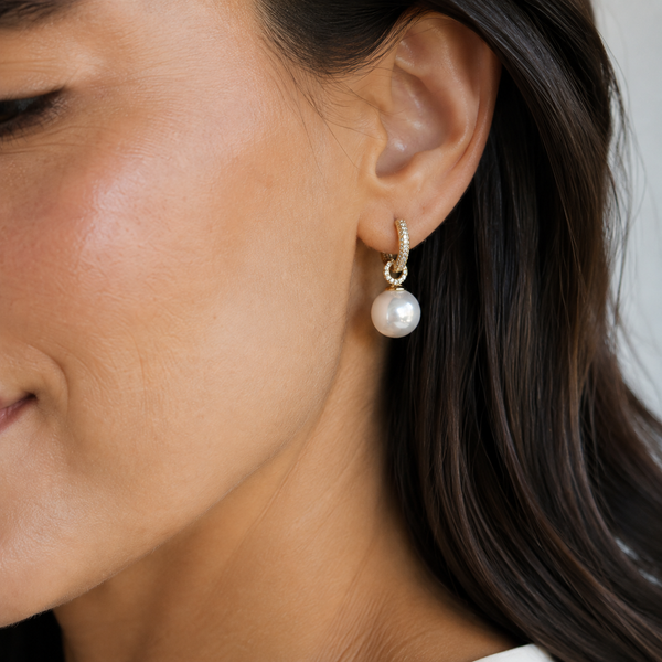 Pearl Drop Huggie Earrings — wearing view — CRYSTARO