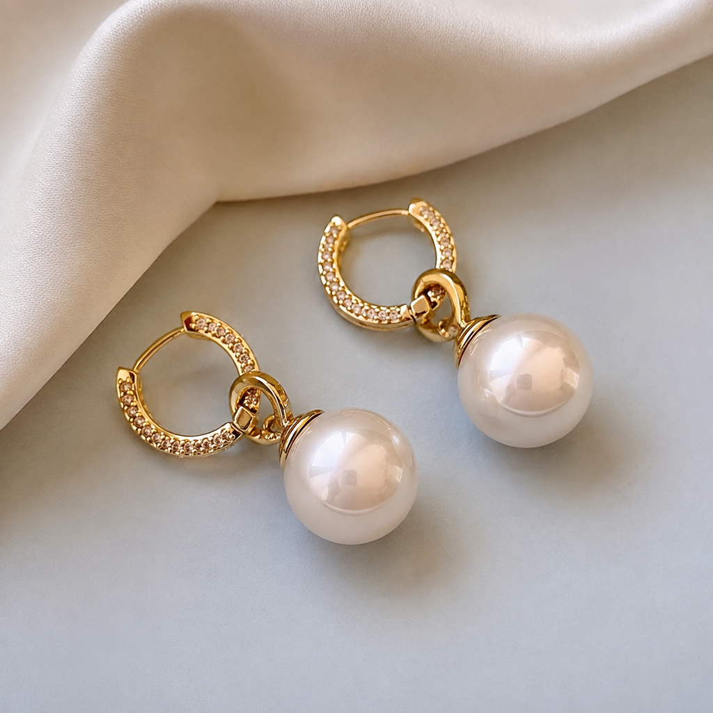 Pearl Drop Huggie Earrings — angle and structure view — CRYSTARO