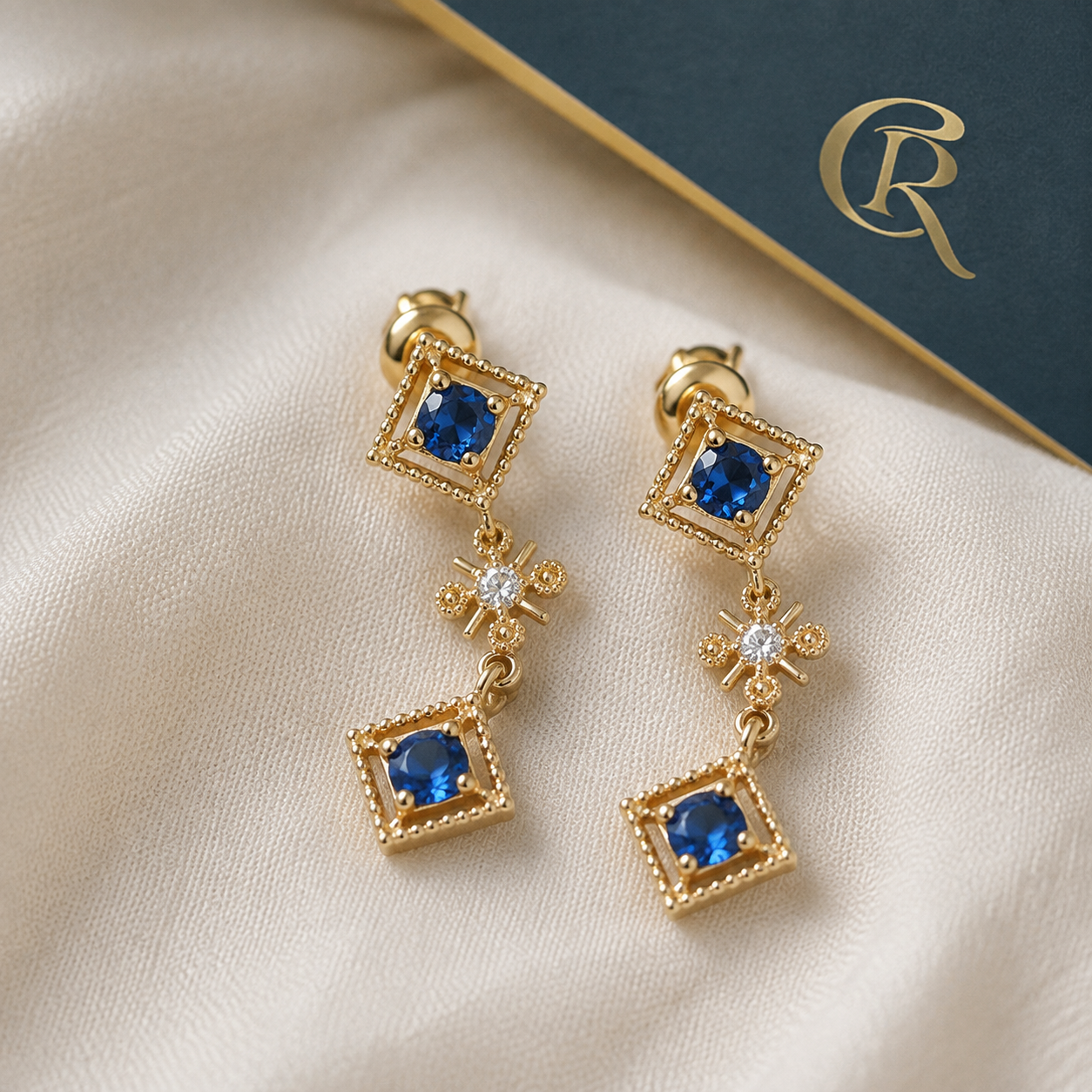 Blue Gemstone Drop Earrings — styled product still life — CRYSTARO