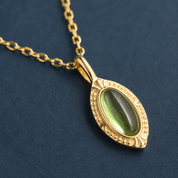 Vintage Green Oval Crystal Pendant Necklace — craftsmanship close-up — CRYSTARO