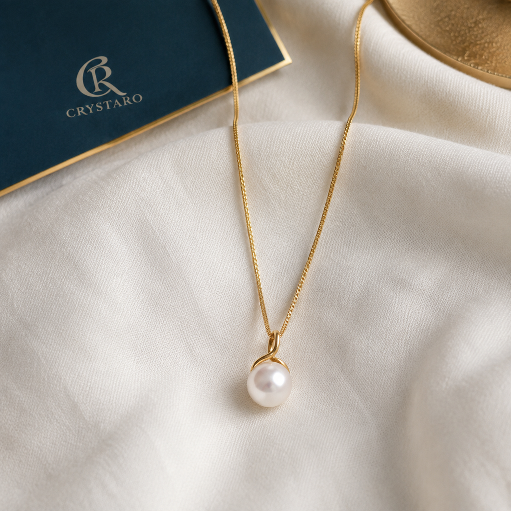 Minimalist Pearl Pendant Necklace — styled product still life — CRYSTARO