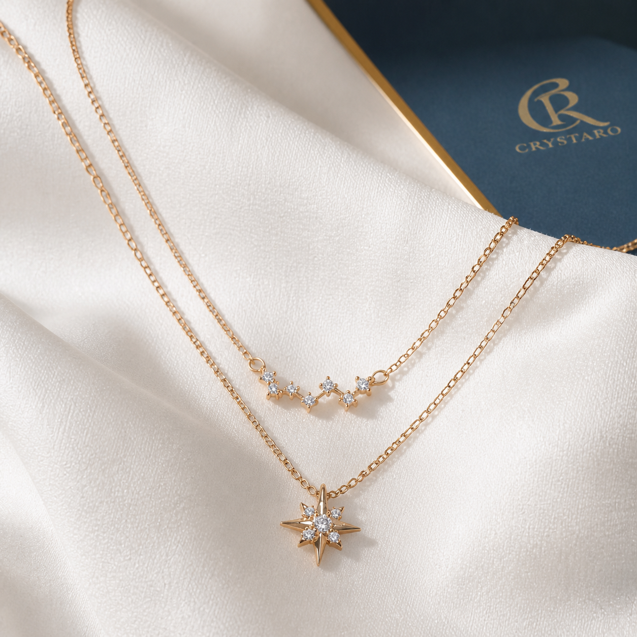 Layered Celestial Star Necklace — styled product still life — CRYSTARO