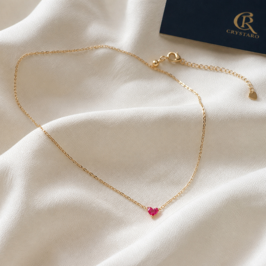 Vintage Red Gemstone Heart Necklace — styled product still life — CRYSTARO