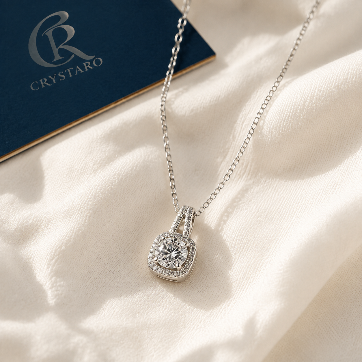 Blue Oval Bezel Pendant Necklace — styled product still life — CRYSTARO