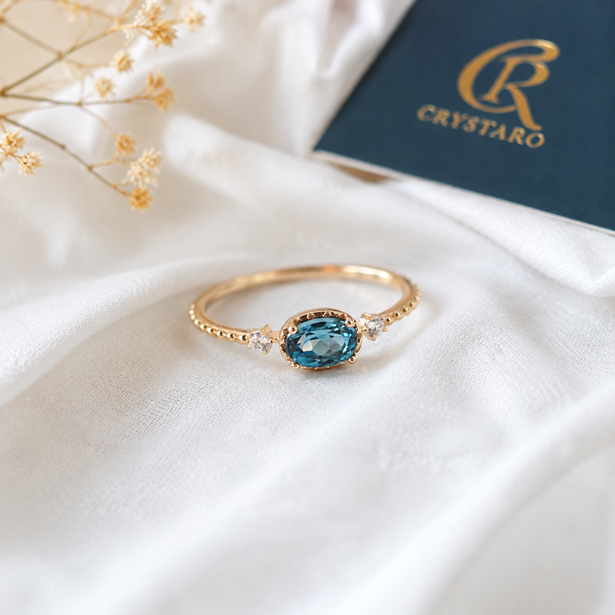 Minimalist Teal Oval Bezel Ring — styled product still life — CRYSTARO