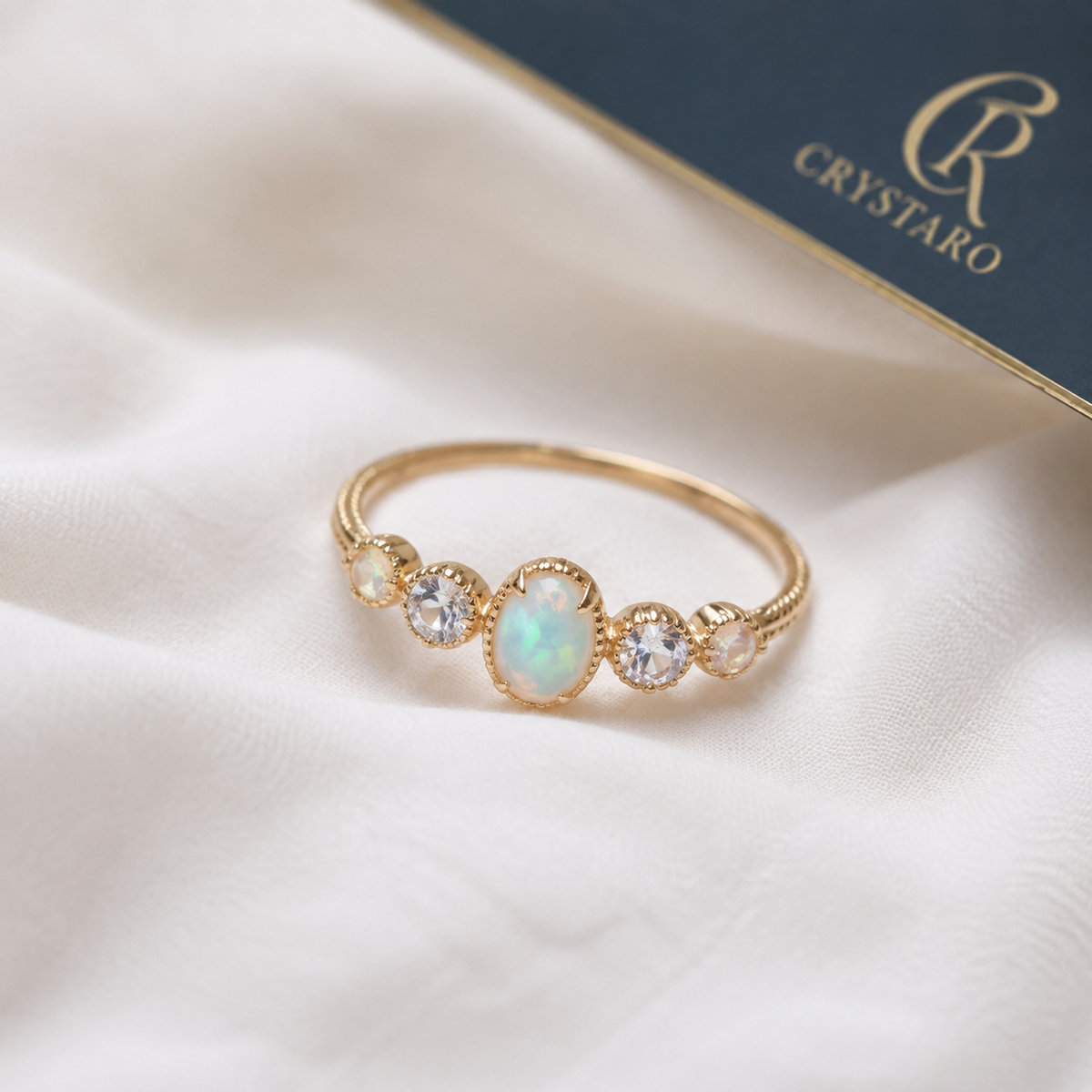Opal-Look Bezel Delicate Ring — styled product still life — CRYSTARO